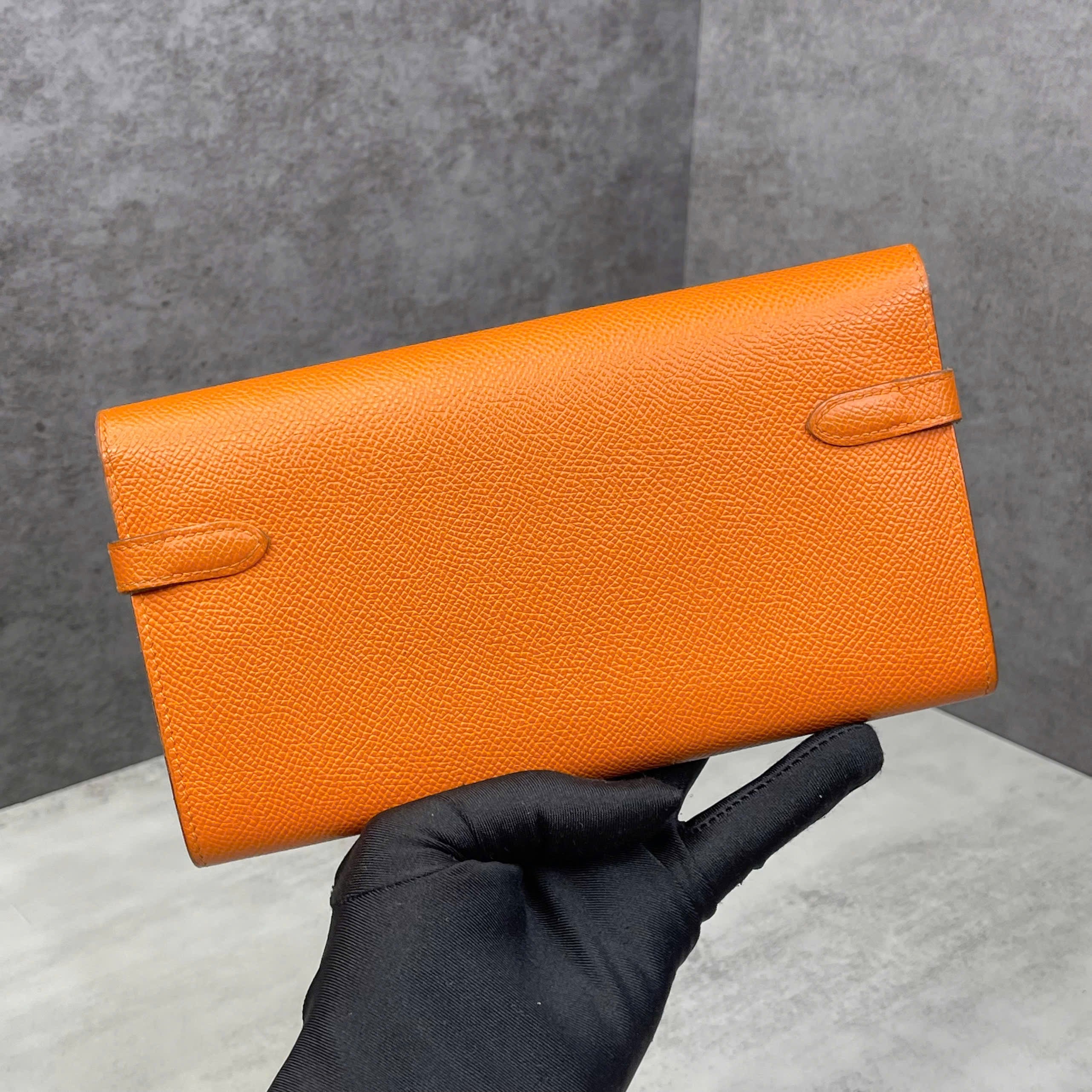 Hermès Kelly Long Wallet Epsom Stamp R màu Orange