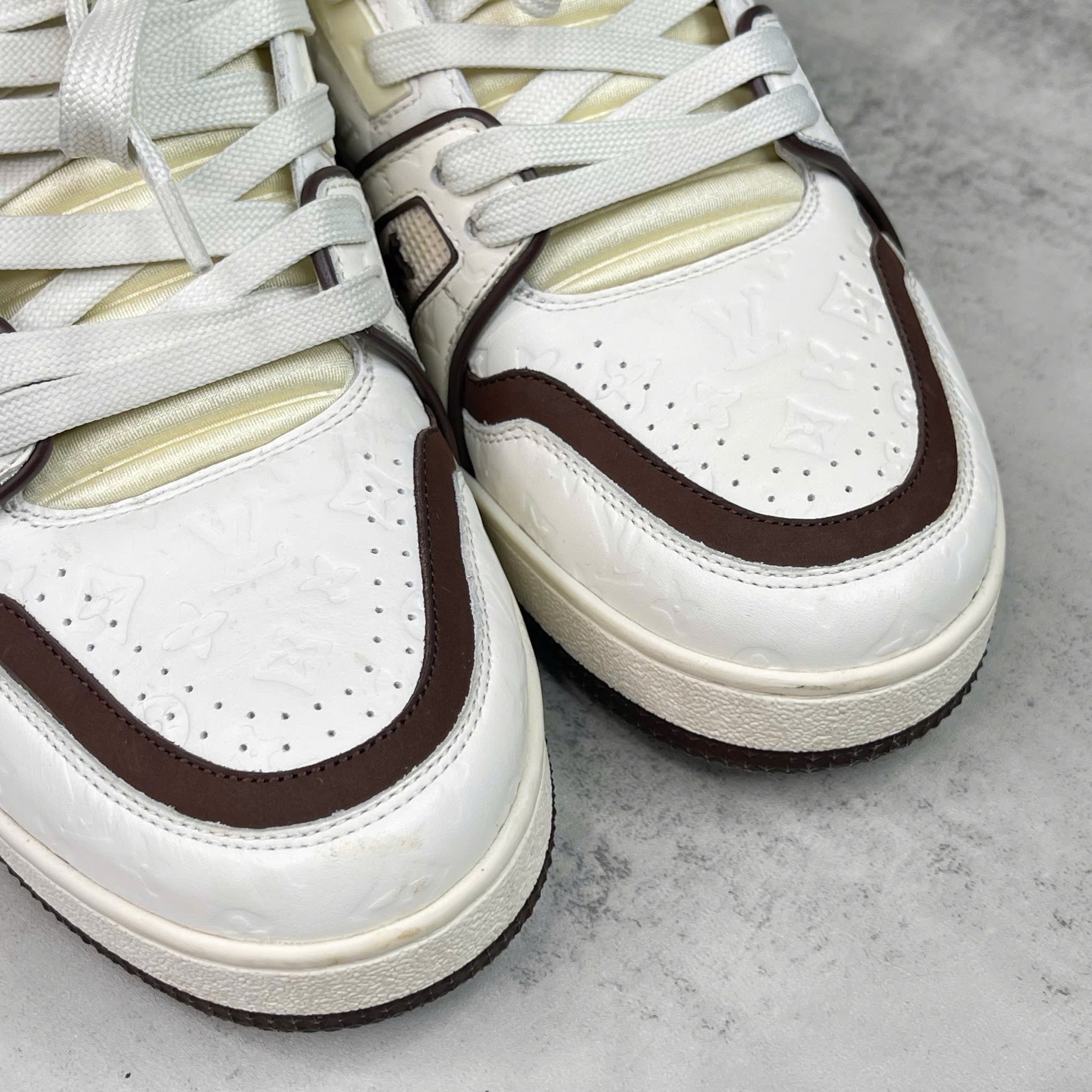 Giày Louis Vuitton LV Trainer Low Top Monogram Embossed Leather Màu Trắng Nâu size 36