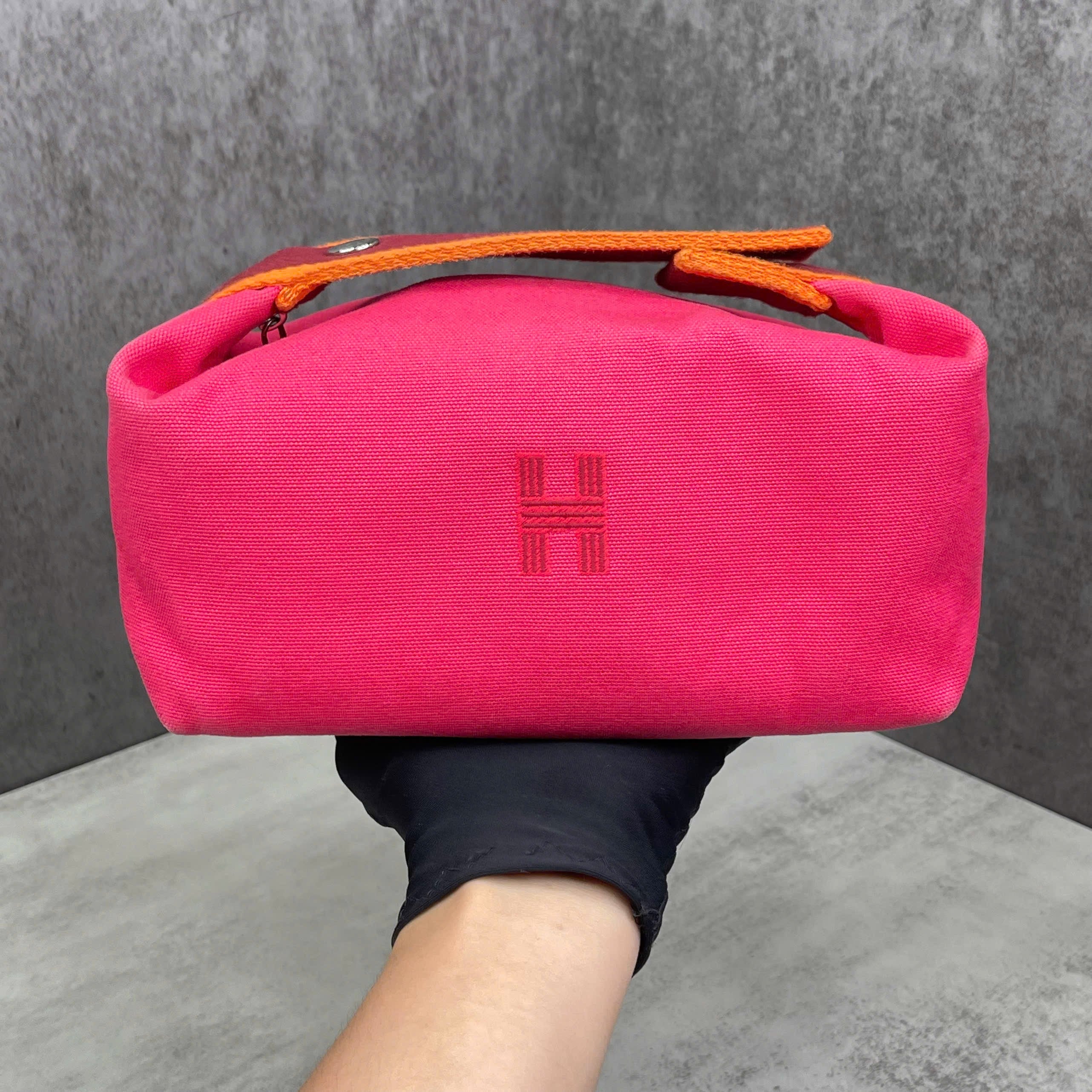 Hermès túi canvas màu hồng phối cam