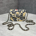 Chanel mini flap bag code chip họa tiết graphic màu đen – vàng
