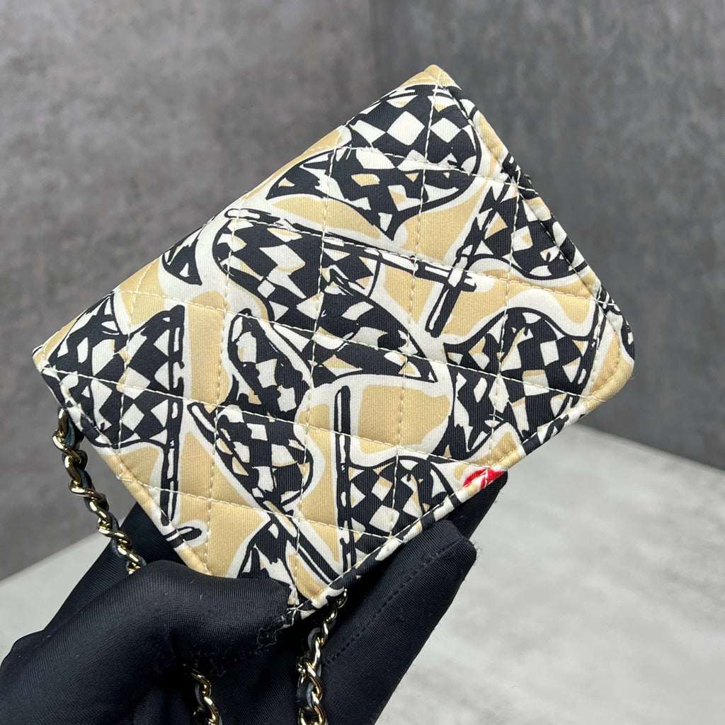 Chanel mini flap bag code chip họa tiết graphic màu đen – vàng