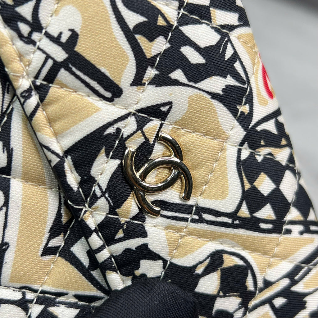 Chanel mini flap bag code chip họa tiết graphic màu đen – vàng