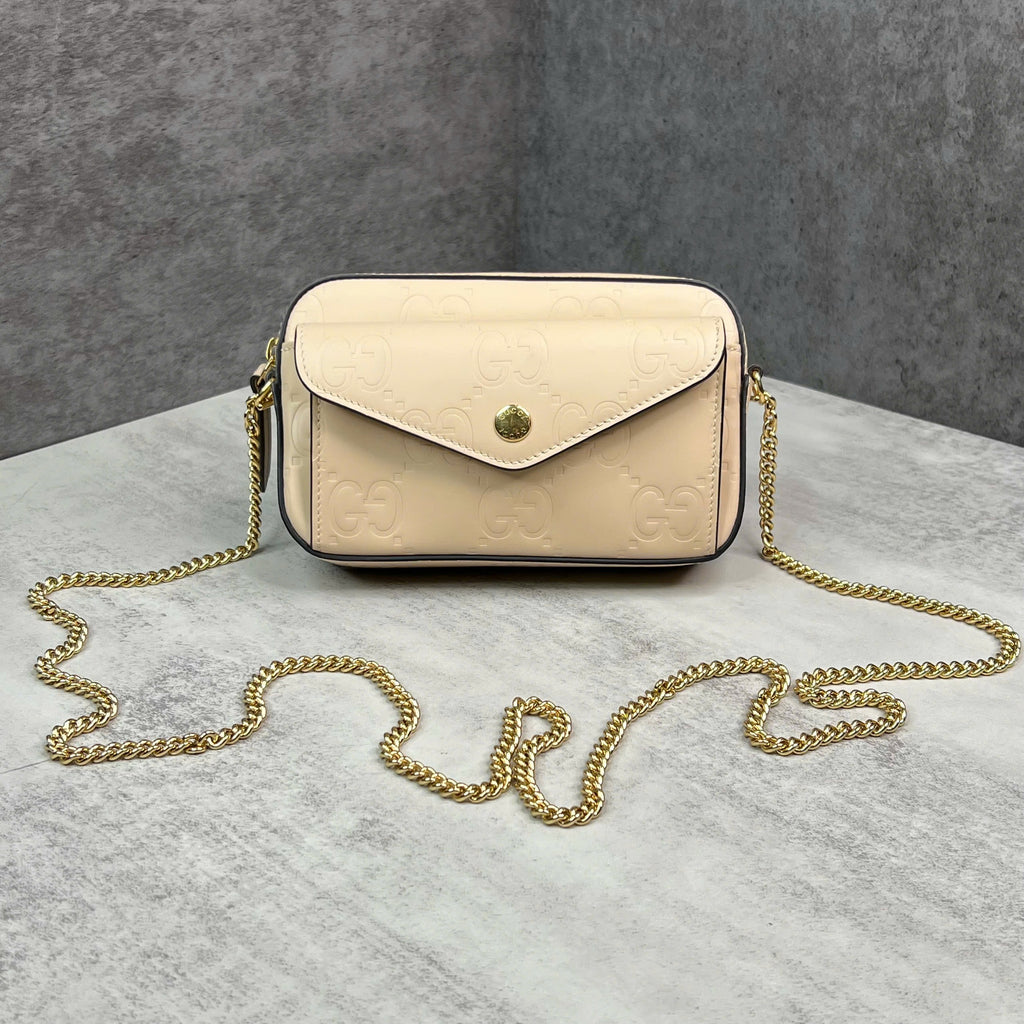 Gucci GG Embossed Chain Shoulder Bag da màu kem