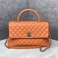 Chanel Coco 12.5 da caviar chần bông màu cam